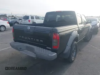 2003 Nissan Frontier XE with VIN 1N6ED27T23C458693, listed as a IAAI auction lot 41932151 with 257,185 mi miles and . Bid and sale history available at DreamBid. Image 4.