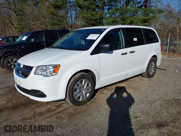 2019 Dodge Grand Caravan SE with VIN 2C4RDGBG2KR799660, listed as a IAAI auction lot 41898556 with 104,642 mi miles and . Bid and sale history available at DreamBid. Image 20.