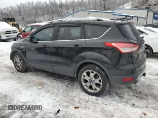 2015 Ford Escape Titanium with VIN 1FMCU9J99FUB17897, listed as a Copart auction lot 88105025 with 112,936 mi miles and Salvage Title. Bid and sale history available at carsss.com. Image 2.