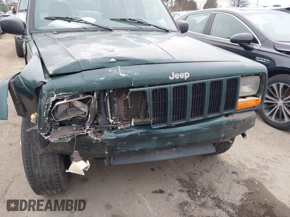 2000 Jeep Cherokee with VIN 1J4FT48S6YL102373, listed as a IAAI auction lot 41685817 with 214,106 mi miles and . Bid and sale history available at DreamBid. Image 6.