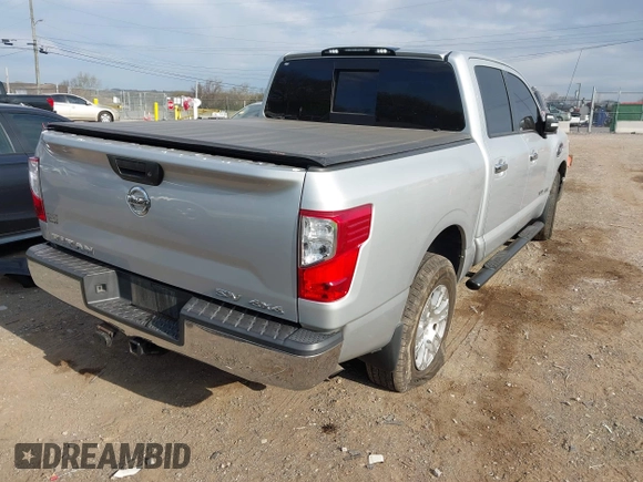 2017 Nissan Titan SV with VIN 1N6AA1EJ3HN538034, listed as a IAAI auction lot 41863785 with 204,198 mi miles and . Bid and sale history available at DreamBid. Image 4.