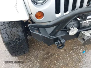 2012 Jeep Wrangler Unlimited Call of Duty MW3 with VIN 1C4BJWFG7CL281844, listed as a IAAI auction lot 42494946 with 93,669 mi miles and . Bid and sale history available at DreamBid. Image 6.