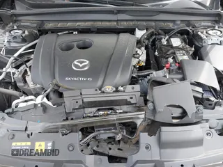 2024 Mazda CX-50 S Preferred z VIN 7MMVABBM0RN160085, wystawiony jako IAAI lot #41756979 z przebiegiem 19 353 mil mil oraz . Historia ofert i sprzedaży dostępna na DreamBid. Obrazek 10.