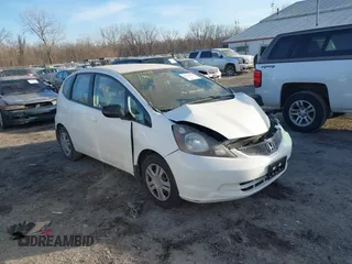 2009 Honda Fit z VIN JHMGE88249S067463, wystawiony jako IAAI lot #41354698 z przebiegiem 153 402 mil mil oraz . Historia ofert i sprzedaży dostępna na DreamBid. Obrazek 1.