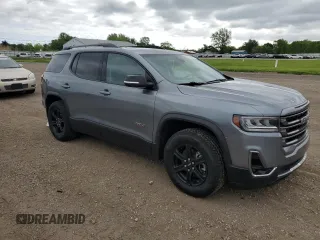 2021 GMC Acadia AT4 with VIN 1GKKNLLS3MZ206914, listed as a Copart auction lot 57458245 with 71,480 mi miles and Salvage title. Bid and sale history available at DreamBid. Image 4.