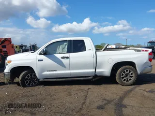 2014 Toyota Tundra 4WD Truck SR with VIN 5TFUY5F1XEX385475, listed as a IAAI auction lot 41563188 with 135,310 mi miles. Bid and sale history available at carsss.com. Image 14.