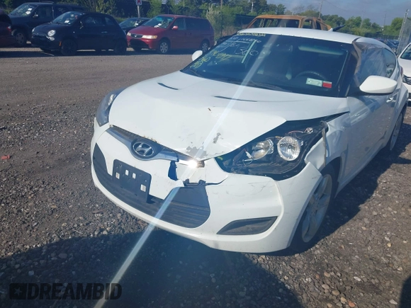 2013 Hyundai Veloster w/Gray Int with VIN KMHTC6AD2DU115735, listed as a IAAI auction lot 39404347 with 166,840 mi miles and . Bid and sale history available at DreamBid. Image 6.