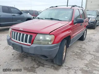 2004 Jeep Grand Cherokee Laredo with VIN 1J4GX48S14C259215, listed as a IAAI auction lot 41906121 with 142,668 mi miles. Bid and sale history available at carsss.com. Image 2.