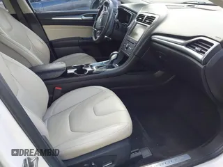 2016 Ford Fusion Titanium with VIN 3FA6P0K96GR400436, listed as a IAAI auction lot 42191256 with 128,447 mi miles and . Bid and sale history available at DreamBid. Image 5.