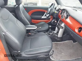2006 MINI Convertible with VIN WMWRF33546TF65857, listed as a IAAI auction lot 41814032 with 91,736 mi miles and . Bid and sale history available at DreamBid. Image 5.