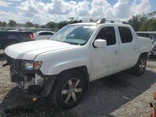 2014 Honda Ridgeline SE with VIN 5FPYK1F61EB013239, listed as a Copart auction lot 72755774 with 133,114 mi miles and Salvage Title. Bid and sale history available at carsss.com. Image 1.