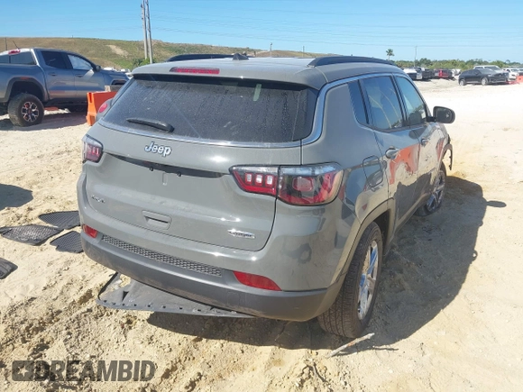 2024 Jeep Compass Latitude with VIN 3C4NJDBN5RT586715, listed as a IAAI auction lot 41840320 with 5,636 mi miles and . Bid and sale history available at DreamBid. Image 4.
