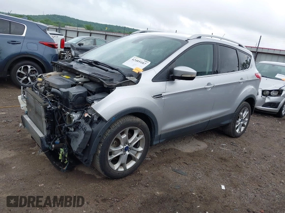 2015 Ford Escape Titanium with VIN 1FMCU0JX7FUB60418, listed as a IAAI auction lot 42485107 with 82,172 mi miles and . Bid and sale history available at DreamBid. Image 17.