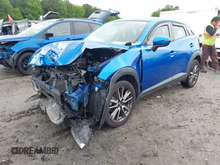 2017 Mazda CX-3 Touring z VIN JM1DKFC7XH0171860, wystawiony jako IAAI lot #42249818 z przebiegiem 54 873 mil mil oraz . Historia ofert i sprzedaży dostępna na DreamBid. Obrazek 2.
