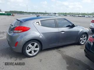 2013 Hyundai Veloster w/Black Int with VIN KMHTC6AD6DU169765, listed as a IAAI auction lot 41928516 with 130,708 mi miles and . Bid and sale history available at DreamBid. Image 13.