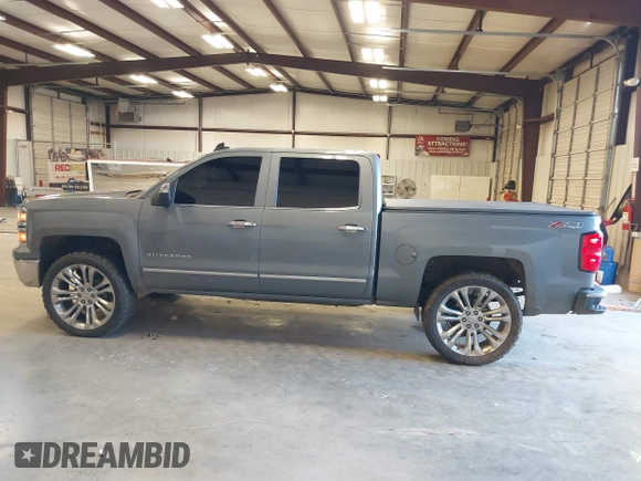 2015 Chevrolet Silverado 1500 LTZ with VIN 3GCUKSEC1FG473825, listed as a IAAI auction lot 41710553 with 212,959 mi miles and . Bid and sale history available at DreamBid. Image 15.