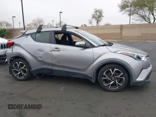 2018 Toyota C-HR XLE with VIN JTNKHMBX5J1011568, listed as a IAAI auction lot 42043867 with 30,699 mi miles. Bid and sale history available at carsss.com. Image 14.