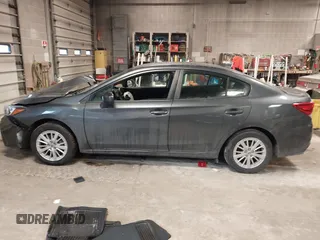 2018 Subaru Impreza Premium z VIN 4S3GKAD67J3619711, wystawiony jako IAAI lot #41475064 z przebiegiem 58 818 mil mil oraz . Historia ofert i sprzedaży dostępna na DreamBid. Obrazek 14.