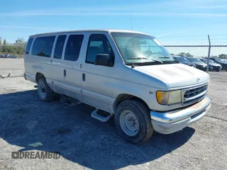 1999 Ford Econoline Passenger XL with VIN 1FBSS31S1XHC00521, listed as a IAAI auction lot 41629239 with 127,085 mi miles. Bid and sale history available at carsss.com. Image 1.
