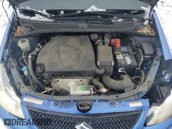 2012 Suzuki SX4 LE z VIN JS2YC5A30C6305375, wystawiony jako Copart lot #45429185 z przebiegiem 103 283 mil mil oraz Szkoda całkowita • Salvage title. Historia ofert i sprzedaży dostępna na DreamBid. Obrazek 11.