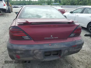 2004 Pontiac Grand Am SE z VIN 1G2NE52F34M596603, wystawiony jako Copart lot #57088665 z przebiegiem 213 295 mil mil oraz Szkoda całkowita • Salvage title. Historia ofert i sprzedaży dostępna na DreamBid. Obrazek 6.