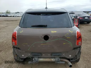 2013 MINI Countryman z VIN WMWZB3C53DWM31457, wystawiony jako Copart lot #55528885 z przebiegiem 137 279 mil mil oraz Szkoda całkowita • Salvage title. Historia ofert i sprzedaży dostępna na DreamBid. Obrazek 6.