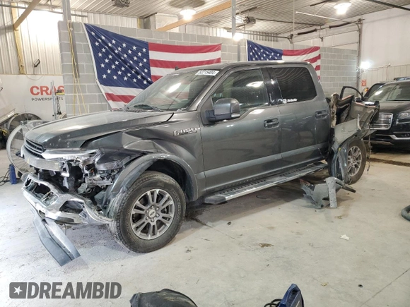 2019 Ford F-150 XL with VIN 1FTEW1E54KFB09804, listed as a Copart auction lot 52215404 with 80,222 mi miles and Salvage Title. Bid and sale history available at carsss.com. Image 1.