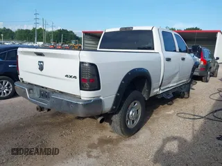 2015 Ram 2500 Tradesman with VIN 3C6UR5CL8FG664889, listed as a IAAI auction lot 42553170 with 169,910 mi miles and . Bid and sale history available at DreamBid. Image 4.