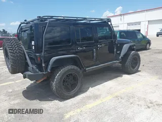 2012 Jeep Wrangler Unlimited Altitude with VIN 1C4HJWEG5CL161049, listed as a IAAI auction lot 42629330 with 217,147 mi miles and . Bid and sale history available at DreamBid. Image 4.