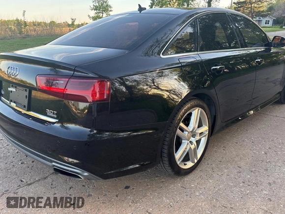 2016 Audi A6 3.0T Premium Plus with VIN WAUFGAFC6GN042406, listed as a Copart auction lot 53582495 with 185,560 mi miles and Clean Title. Bid and sale history available at carsss.com. Image 4.