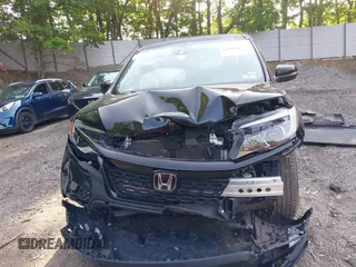 2021 Honda Passport EX-L с VIN 5FNYF8H57MB022083, выставлен на аукционе IAAI как лот 42399294 с пробегом 61 014 миль миль и . История ставок и продаж доступна на DreamBid. Изображение 13.