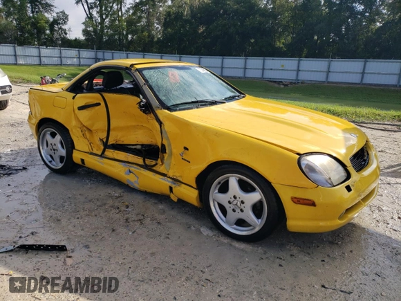 1999 Mercedes-Benz SLK-Class with VIN WDBKK47F9XF076441, listed as a Copart auction lot 73745154 with 104,481 mi miles and Salvage Title. Bid and sale history available at carsss.com. Image 4.