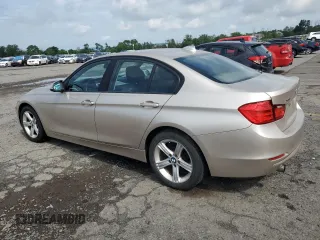 2013 BMW 3 Series 320i xDrive with VIN WBA3C3C50DF982982, listed as a Copart auction lot 62883045 with 189,875 mi miles and Clean title. Bid and sale history available at DreamBid. Image 2.