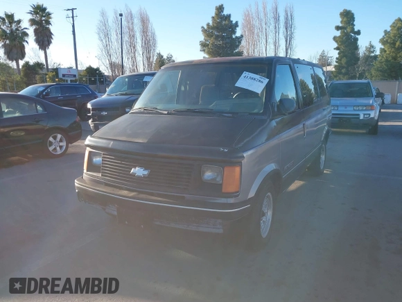1991 Chevrolet Astro with VIN 1GNDM19Z2MB123653, listed as a IAAI auction lot 41388286 with 175,009 mi miles. Bid and sale history available at carsss.com. Image 6.