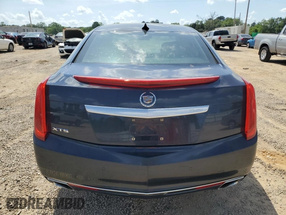 2015 Cadillac XTS Luxury z VIN 2G61M5S32F9169354, wystawiony jako Copart lot #54887215 z przebiegiem 138 795 mil mil oraz Szkoda całkowita • Salvage title. Historia ofert i sprzedaży dostępna na DreamBid. Obrazek 6.