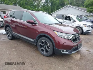 2019 Honda CR-V Touring z VIN 2HKRW2H95KH617890, wystawiony jako IAAI lot #42355272 z przebiegiem 87 743 mil mil oraz . Historia ofert i sprzedaży dostępna na DreamBid. Obrazek 1.