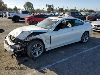 2016 BMW 4 Series 428i xDrive with VIN WBA3N9C57GK248610, listed as a Copart auction lot 84958044 with 62,485 mi miles and Salvage Title. Bid and sale history available at carsss.com. Image 1.