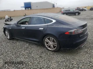 2013 Tesla Model S с VIN 5YJSA1CN5DFP13664, выставлен на аукционе Copart как лот 48177805 с пробегом 116 268 миль миль и Списание • Salvage title. История ставок и продаж доступна на DreamBid. Изображение 2.