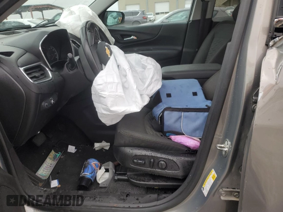 2018 Chevrolet Equinox LT z VIN 3GNAXJEV6JS504130, wystawiony jako Copart lot #87847015 z przebiegiem Nie podano mil oraz Szkoda całkowita • Salvage title. Historia ofert i sprzedaży dostępna na DreamBid. Obrazek 7.