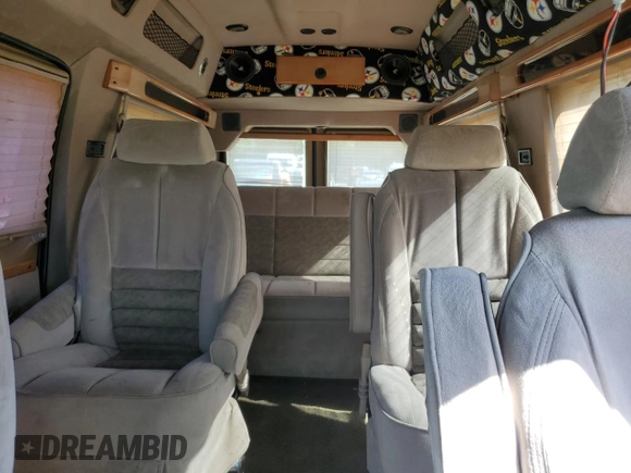 2002 Ford Econoline Cargo with VIN 1FDRE14W62HB15506, listed as a Copart auction lot 74686494 with 253,296 mi miles and Salvage Title. Bid and sale history available at DreamBid. Image 10.