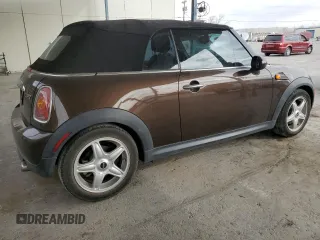 2010 MINI Convertible with VIN WMWMR3C50ATU97547, listed as a Copart auction lot 44780185 with 91,194 mi miles and Salvage Title. Bid and sale history available at DreamBid. Image 3.