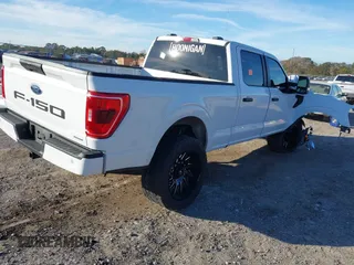 2023 Ford F-150 XL with VIN 1FTFW1E83PFA07321, listed as a IAAI auction lot 41132986 with 25,997 mi miles. Bid and sale history available at carsss.com. Image 4.