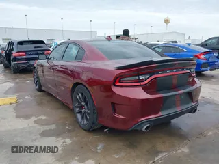 2020 Dodge Charger Scat Pack z VIN 2C3CDXGJ8LH132985, wystawiony jako IAAI lot #41316849 z przebiegiem 66 881 mil mil oraz . Historia ofert i sprzedaży dostępna na DreamBid. Obrazek 3.