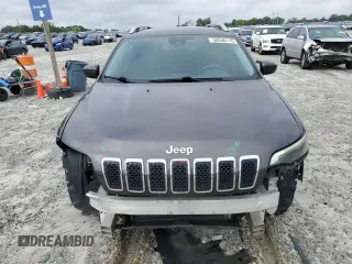 2021 Jeep Cherokee Altitude с VIN 1C4PJLLB5MD112348, выставлен на аукционе Copart как лот 59536115 с пробегом 129 897 миль миль и Списание • Salvage title. История ставок и продаж доступна на DreamBid. Изображение 5.