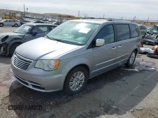2013 Chrysler Town & Country Limited with VIN 2C4RC1GGXDR548106, listed as a IAAI auction lot 41890220 with 189,908 mi miles. Bid and sale history available at carsss.com. Image 2.
