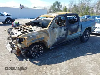 2023 Toyota Tacoma SR z VIN 3TYCZ5AN2PT132764, wystawiony jako IAAI lot #41832334 z przebiegiem 200 000 mil mil oraz . Historia ofert i sprzedaży dostępna na DreamBid. Obrazek 2.