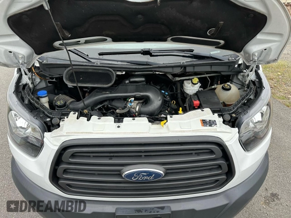 2018 Ford Transit с VIN 1FDZX2XM0JKB25878, выставлен на аукционе Copart как лот 55781625 с пробегом 159 495 миль миль и Чистый • Clean title. История ставок и продаж доступна на DreamBid. Изображение 9.