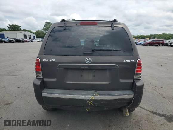 2007 Mercury Mariner Luxury with VIN 4M2YU91137KJ11539, listed as a Copart auction lot 64846175 with 139,488 mi miles and Salvage title. Bid and sale history available at DreamBid. Image 6.