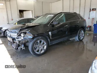 2010 Cadillac SRX Premium Collection z VIN 3GYFNCEY9AS517815, wystawiony jako Copart lot #52088385 z przebiegiem 179 262 mil mil oraz Szkoda całkowita • Salvage title. Historia ofert i sprzedaży dostępna na DreamBid. Obrazek 1.