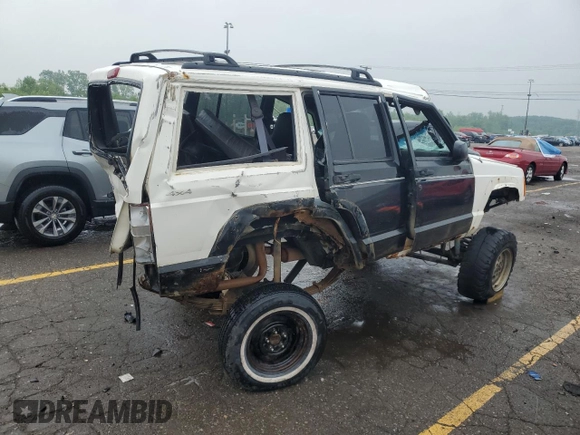 2001 Jeep Cherokee Sport with VIN 1J4FF48S41L611052, listed as a Copart auction lot 59667135 with 270,448 mi miles and Clean title. Bid and sale history available at DreamBid. Image 3.